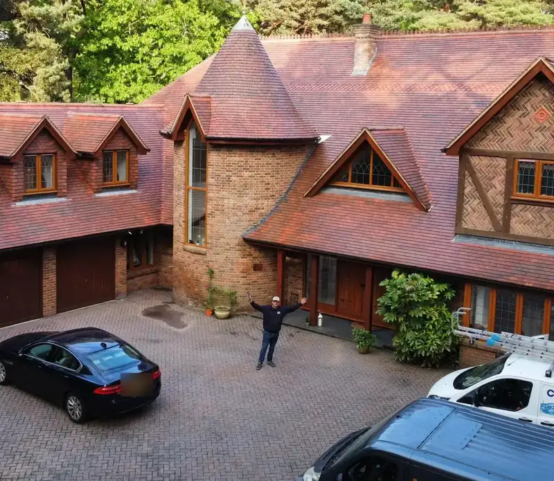 A large detached house with a tiled roof